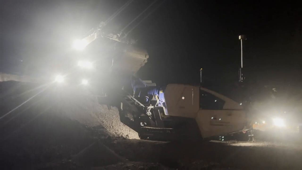 Screening plant running under floodlights during a night shift
